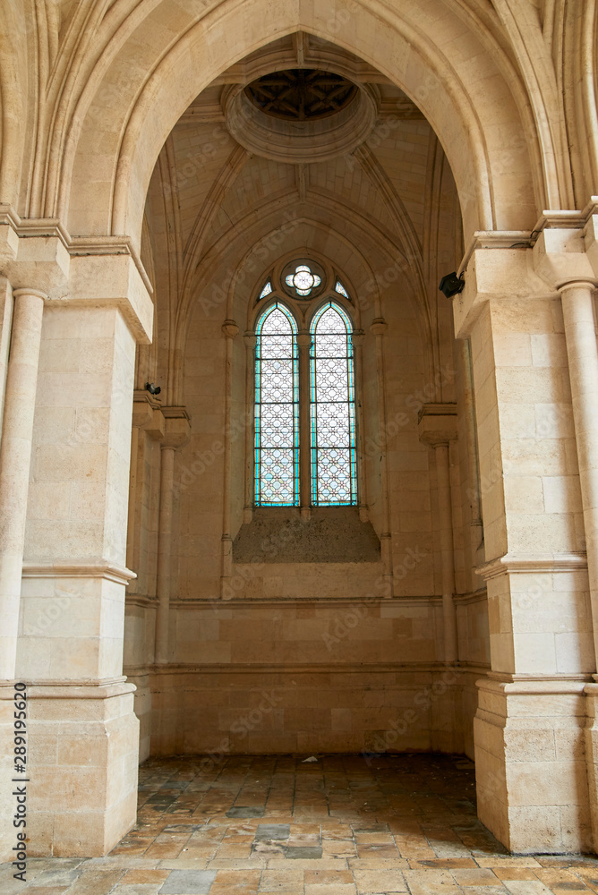 Archway in a cove in an old church in France