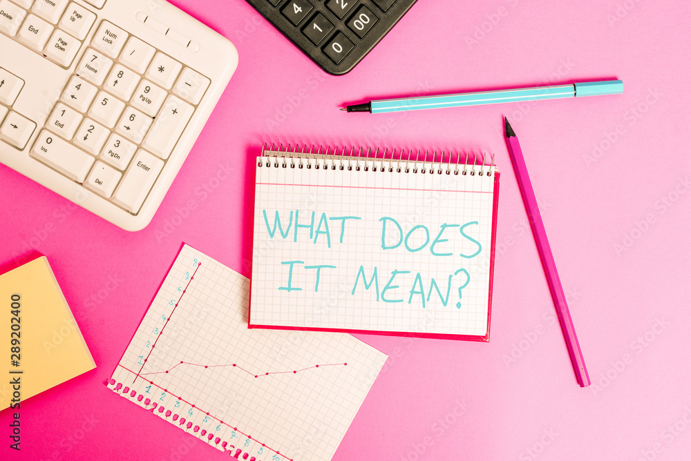Word writing text What Does It Mean question. Business photo showcasing intended to communicate unclear statement Writing equipments and computer stuffs placed above classic wooden table Word writing text What Does It Mean question. Business photo showcasing intended to communicate unclear statement Writing equipments and computer stuffs placed above classic wooden table