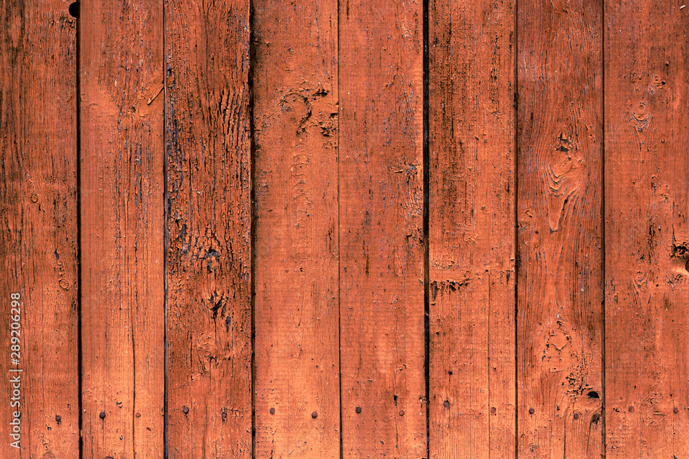 Background of old brown grunge fence. Vertical boards. Texture of dark wooden rustic panels. Background of old brown grunge fence. Vertical boards. Texture of dark wooden rustic panels.