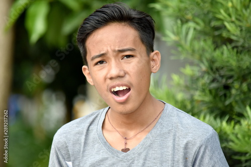A Startled Youthful Minority Boy