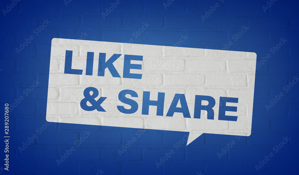 白い煉瓦壁にLIKE & SHAREの文字 白い煉瓦壁にLIKE & SHAREの文字