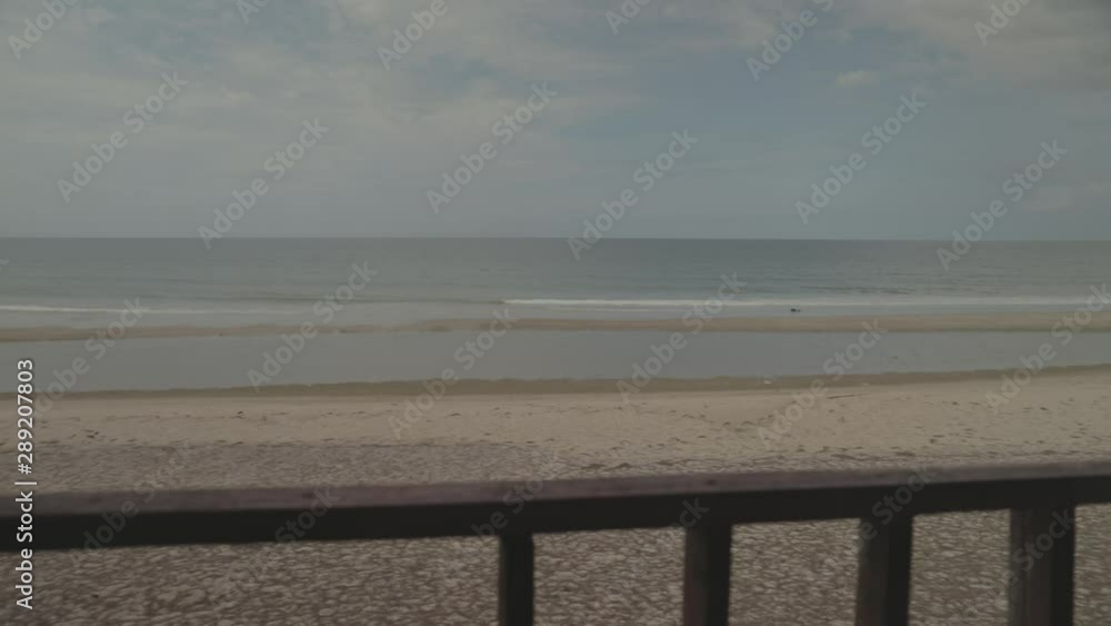 Looking at the sea and the clouds from the beach. (Slowmotion - Angle 011) Looking at the sea and the clouds from the beach. (Slowmotion - Angle 011)