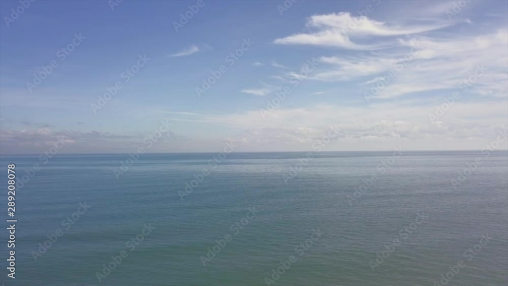 Steady Aerial Shot of Ocean with Blue Skies and Clouds in Nasipit Agusan Del Norte Philippines Steady Aerial Shot of Ocean with Blue Skies and Clouds in Nasipit Agusan Del Norte Philippines