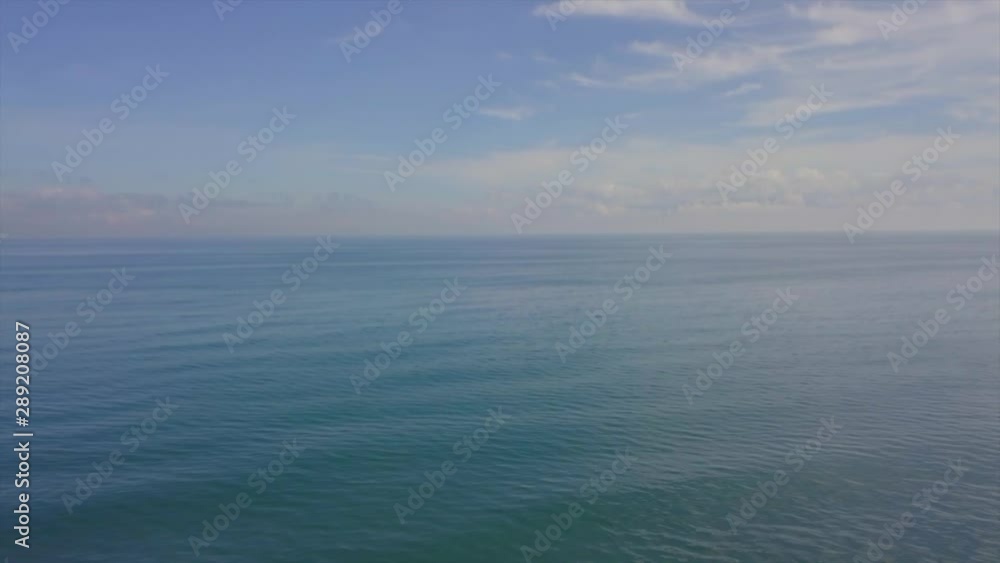 Forward Aerial and Pan down Shot of Ocean with Blue Skies and Clouds in Nasipit Agusan Del Norte Philippines Forward Aerial and Pan down Shot of Ocean with Blue Skies and Clouds in Nasipit Agusan Del Norte Philippines