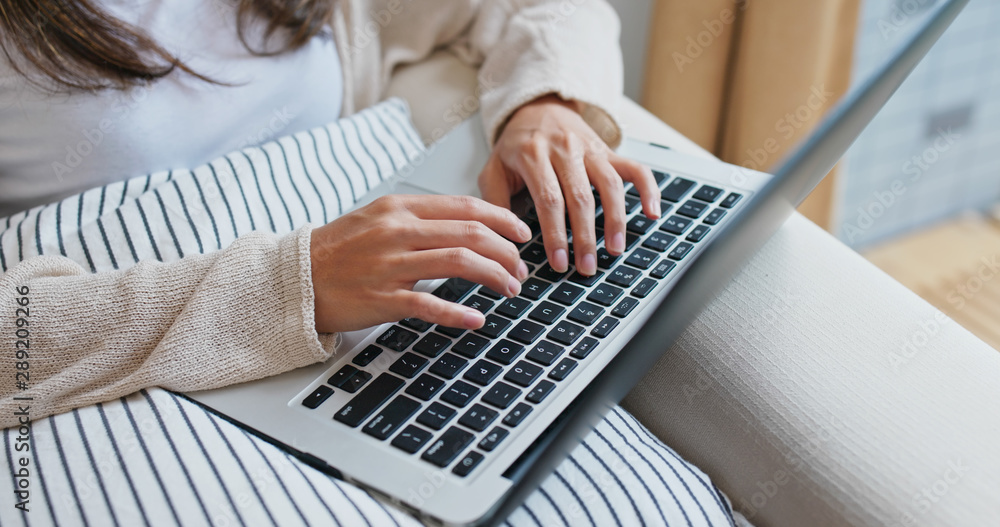 Woman works on computer at home Woman works on computer at home