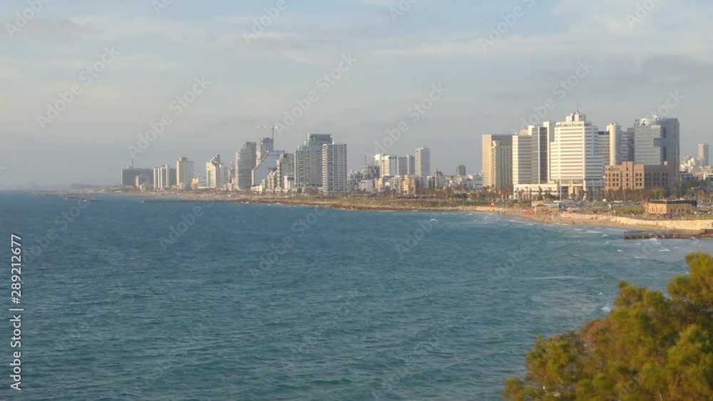 Panorama of Tel Aviv at sunset, coastal line with hotels, taken from old Jaffa. Cityscape of Tel Aviv, Israel Panorama of Tel Aviv at sunset, coastal line with hotels, taken from old Jaffa. Cityscape of Tel Aviv, Israel
