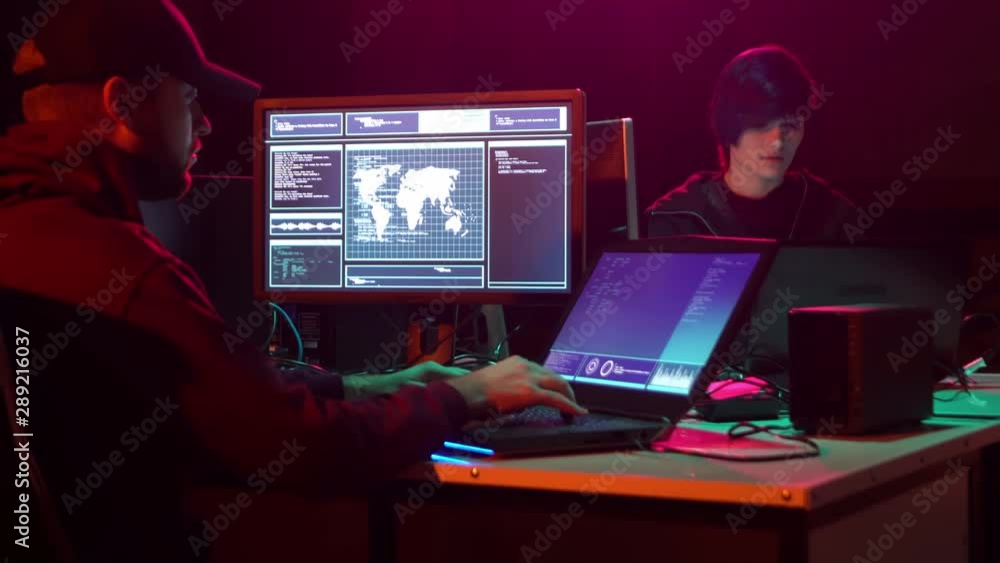 Internet fraud, darknet, data thief, cybercrime concept. Hacker attack on government server. Criminals coding virus programs. Internet fraud, darknet, data thief, cybercrime concept. Hacker attack on government server. Criminals coding virus programs.