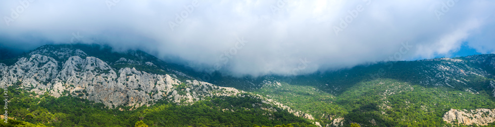 View of mountain with clouds View of mountain with clouds