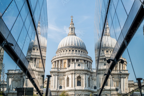 St. Paul's Cathedral church ireflected in glass walls of One New Change in London. photo