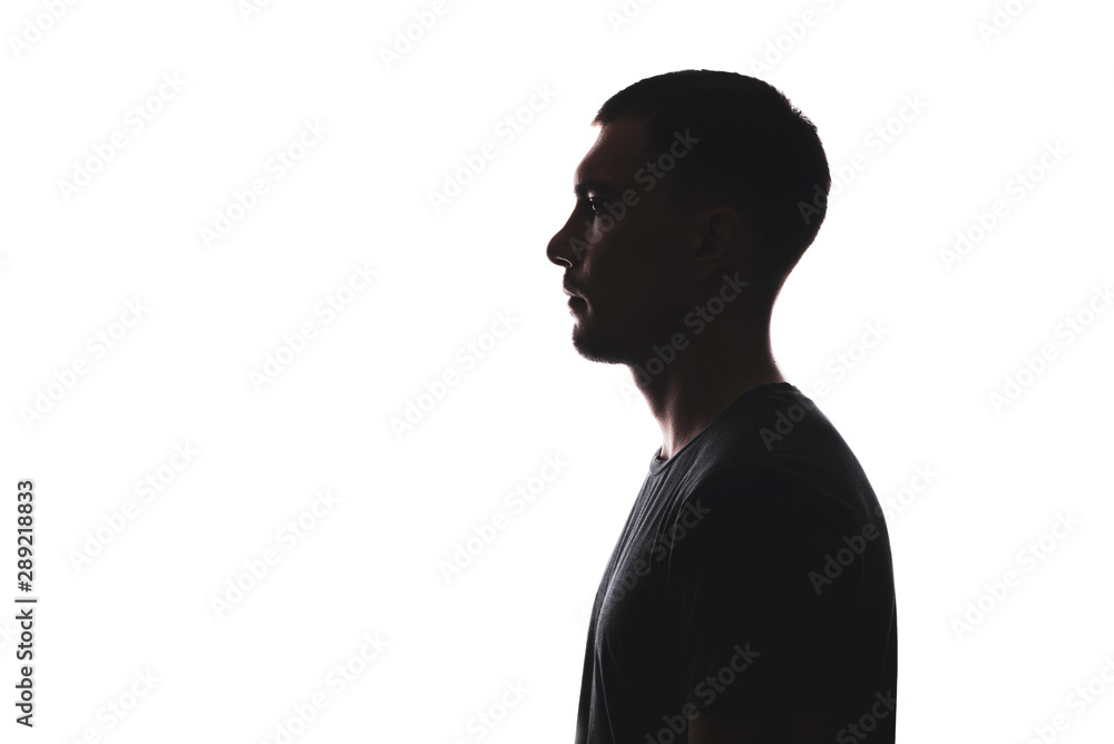 Silhouette portrait of young European man in profile isolated on white background - obrazy, fototapety, plakaty 