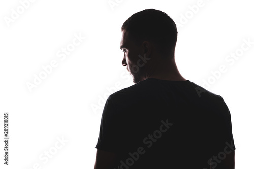 Silhouette portrait of man with his back looking away, isolated on a white background