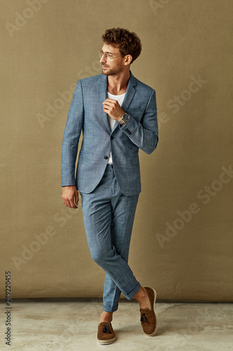 Handsome businessman in blue casual suit