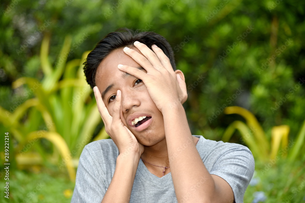 A Stressed Filipino Teen Boy A Stressed Filipino Teen Boy