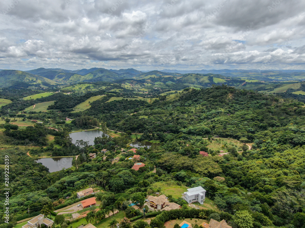 Fototapeta premium Aerial view of luxury villa in tropical valley, Brazil