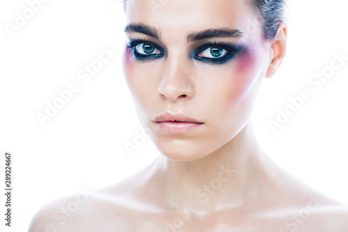 young pretty caucasian girl with fashion style makeup bright colorful eyes isolated on white background  new glamour trends closeup