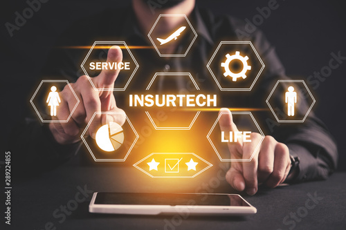 Man with a tablet computer. Insurtech