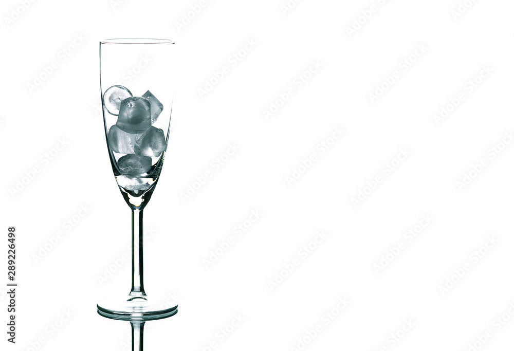 Fototapeta premium Glass with ice cubes, isolated on white
