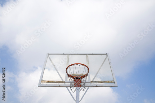 Basketball stand and cloud.