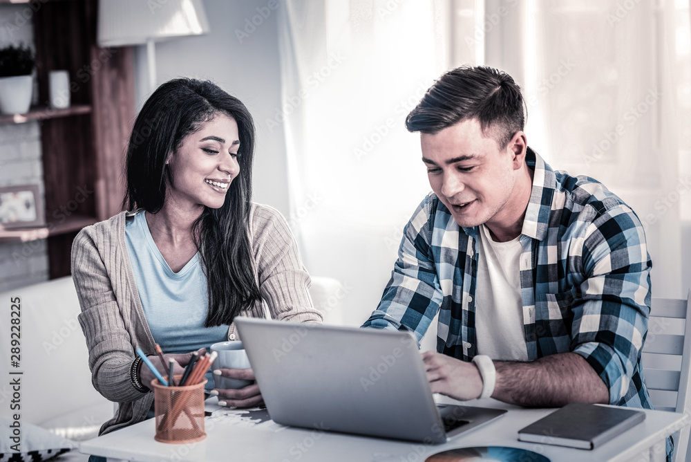 International couple having sweet conversation during morning routine International couple having sweet conversation during morning routine
