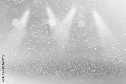 beautiful brilliant glitter lights defocused stage spotlights bokeh abstract background with sparks fly, festival mockup texture with blank space for your content