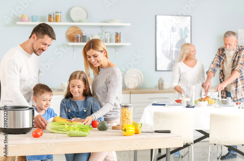 Happy family with modern mu...