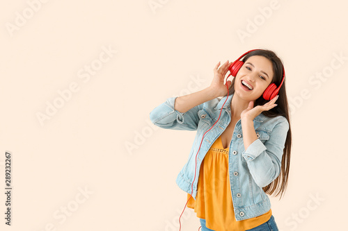 Young woman with headphones...
