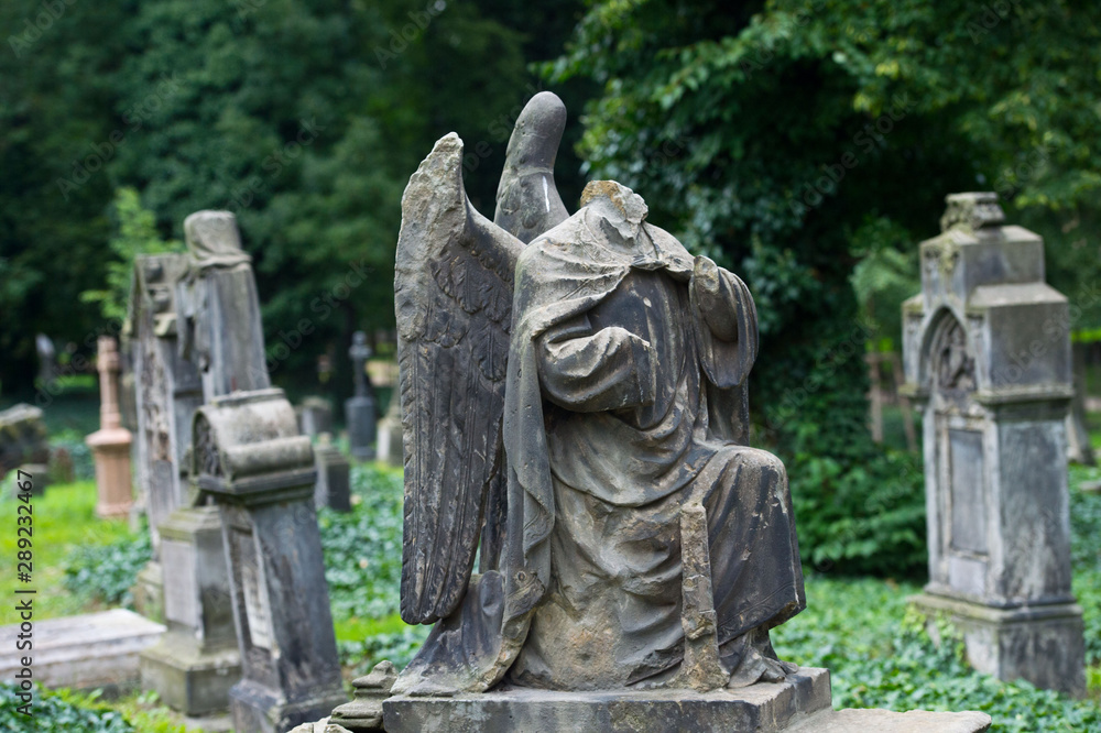 Sculpture of Angel at a Prague cemetery. Czech Republic. Sculpture elements. Sculpture of Angel at a Prague cemetery. Czech Republic. Sculpture elements.