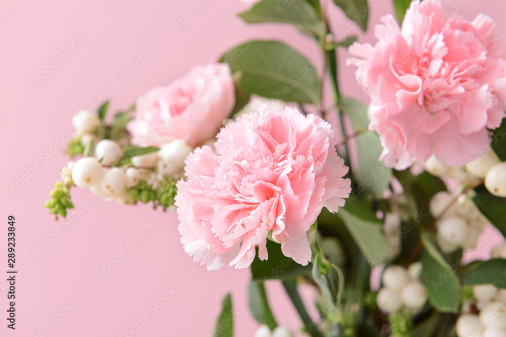 Bouquet of beautiful carnation flowers on color background, closeup Bouquet of beautiful carnation flowers on color background, closeup