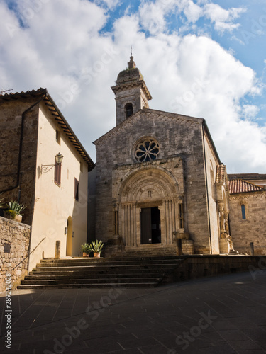 San Quirico church at sunny morning in San Quirico d'Orcia , Siena province, Tuscany, Italy