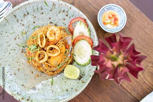 Spicy fried rice with herb and seafood (tom yum fried rice),thai food concept