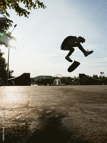 Skateboarder doing a trick on the skateboard