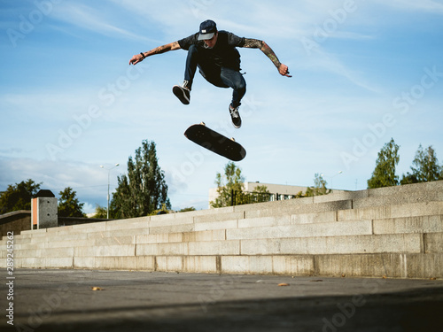 Skateboarder doing a trick on the skateboard