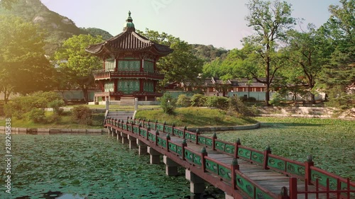 Beautiful sunset view of Hyangwonjeong Pavilion at Gyeongbokgung Palace in Seoul, South Korea. photo