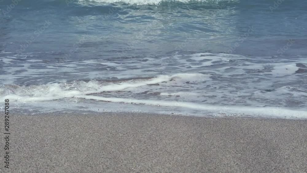 SLOW MOTION, 120FPS, CLOSE UP: Turquoise water of big foam waves splashing on beautiful golden beach SLOW MOTION, 120FPS, CLOSE UP: Turquoise water of big foam waves splashing on beautiful golden beach