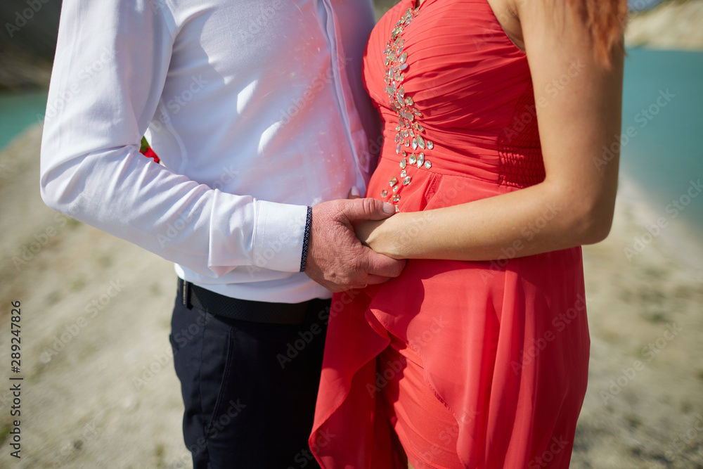 man and woman holding hands man and woman holding hands