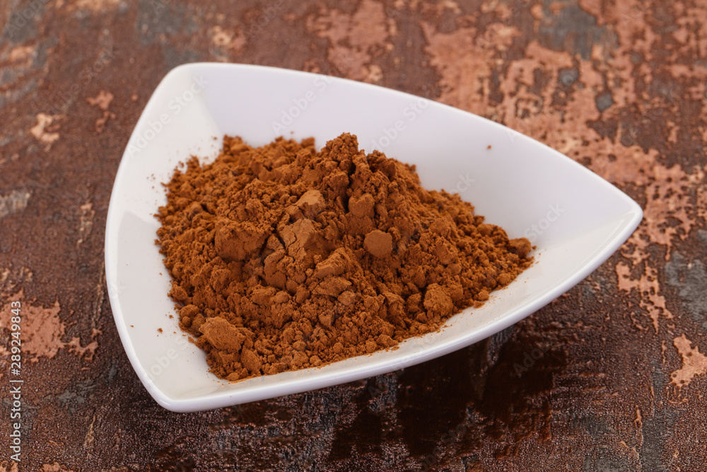 Cocoa powder in the bowl Cocoa powder in the bowl