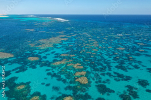 Coral Reef. Aerial photo of Ningaloo Reef in Australia. Shallow reefs are at risk from climate change  © Richard Carey