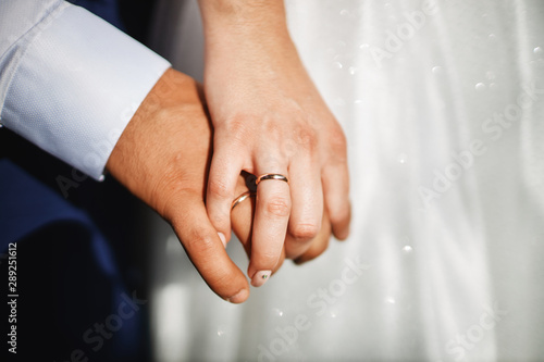 man and woman holding hands