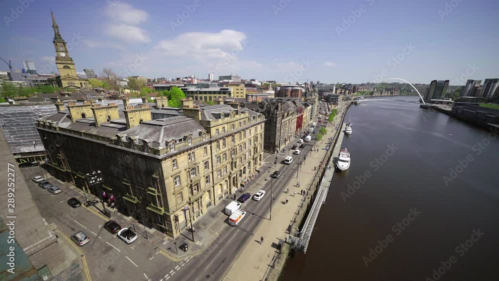 Aerial views of Newcastle Upon Tyne's Quayside with the Millennium Bridge over the River Tyne. England, UK. Aerial views of Newcastle Upon Tyne's Quayside with the Millennium Bridge over the River Tyne. England, UK.