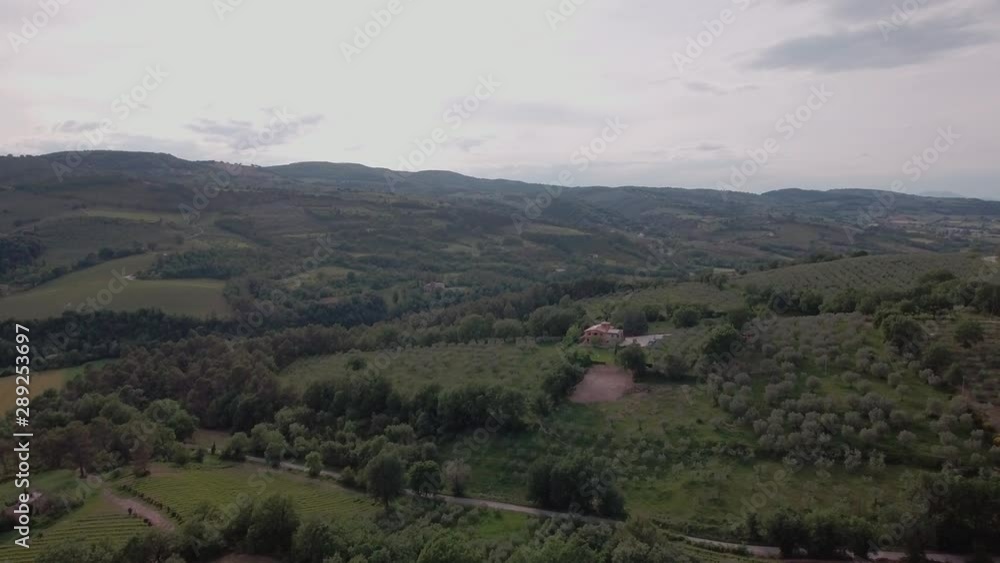 Aerial Drone shot Fly Over Olive Groves and Italian Countryside in Umbria, Italy Aerial Drone shot Fly Over Olive Groves and Italian Countryside in Umbria, Italy