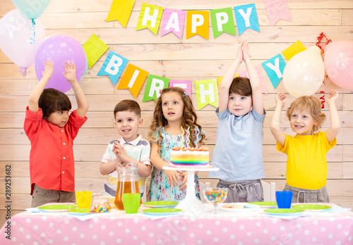 happy children group at tab...