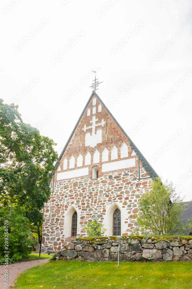 Hollola, Finland - 9 September 2019: Old medieval stone church of St. Mary in Hollola, Finland Hollola, Finland - 9 September 2019: Old medieval stone church of St. Mary in Hollola, Finland