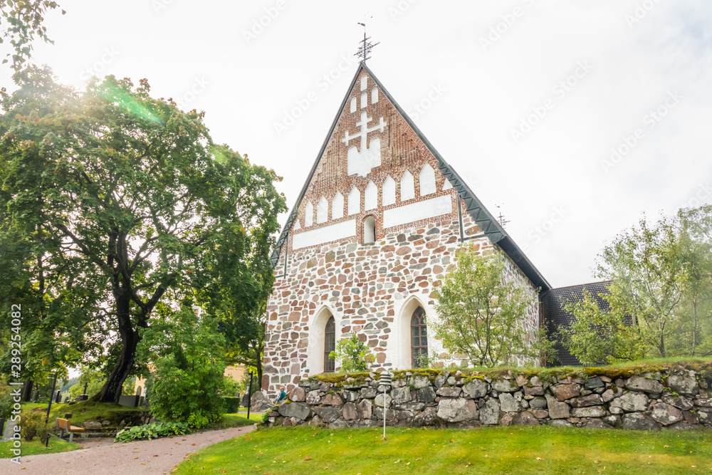 Hollola, Finland - 9 September 2019: Old medieval stone church of St. Mary in Hollola, Finland