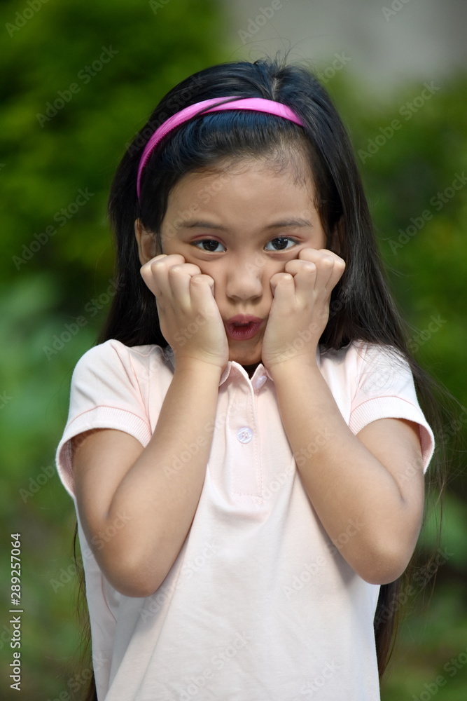 A Young Filipina Tween Afraid A Young Filipina Tween Afraid