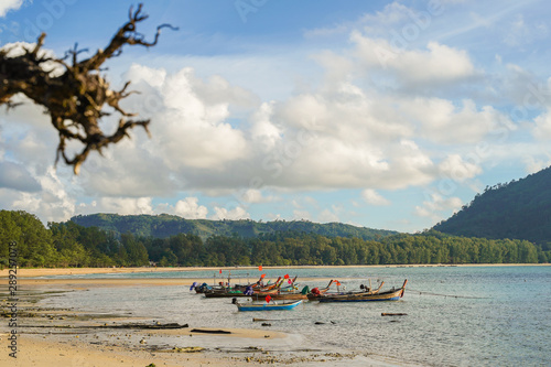 Beautiful sea with long tail boats in southern Phuket.