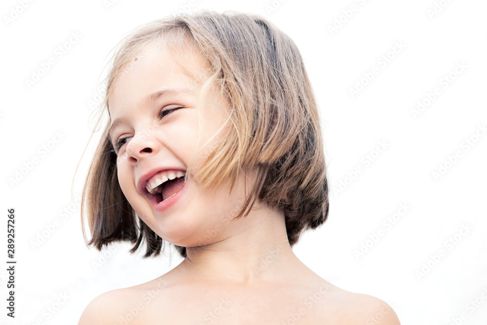a happy smiling 5 years girl againt a white background a happy smiling 5 years girl againt a white background