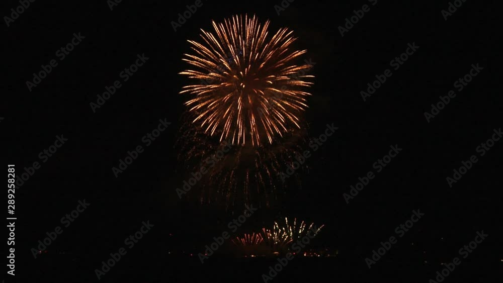 Extract from a huge fireworks display from a festival: Huge multicoloured shells Extract from a huge fireworks display from a festival: Huge multicoloured shells