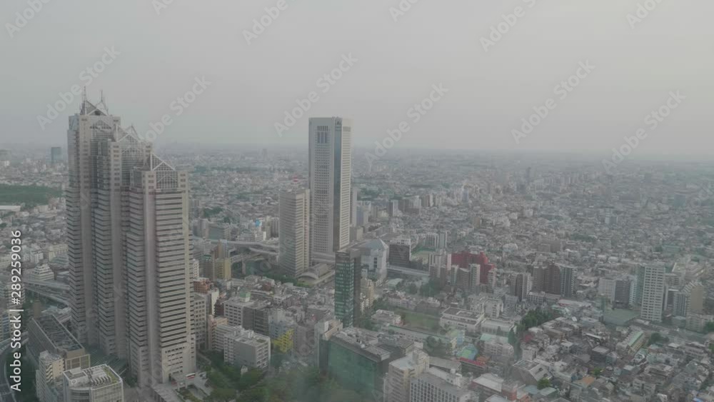 Smooth panning shot of an urban scenery of Tokyo. Smooth panning shot of an urban scenery of Tokyo.