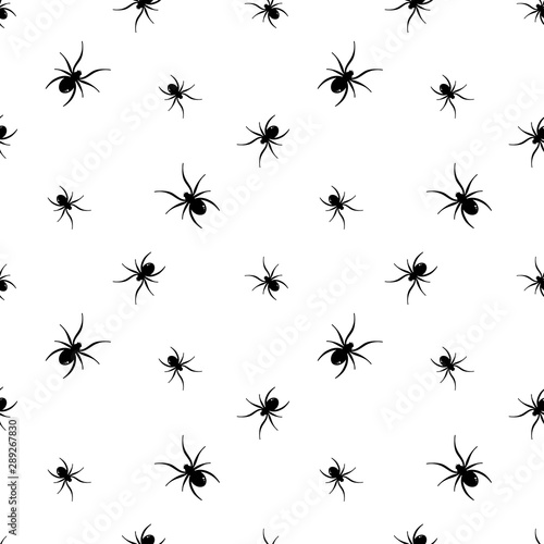 Vector seamless pattern background with spiders for halloween design. © cosmic_pony