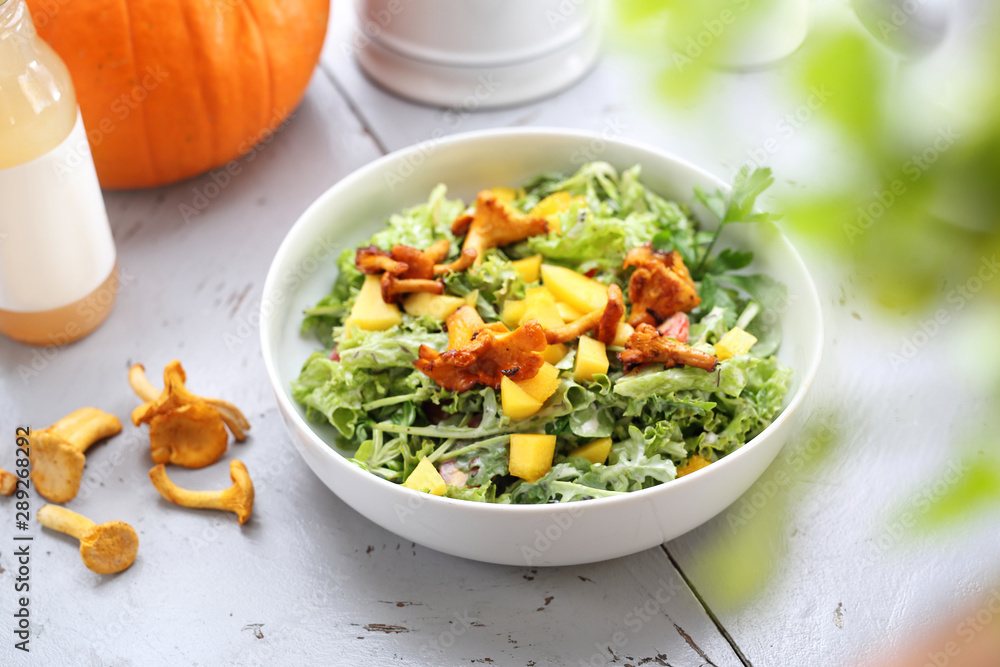 Autumn salad. Green pumpkin salad with marinated chanterelles. Autumn salad. Green pumpkin salad with marinated chanterelles.